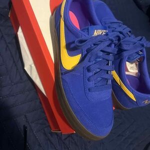 Nike Royal Blue Sneakers with Yellow Swoosh